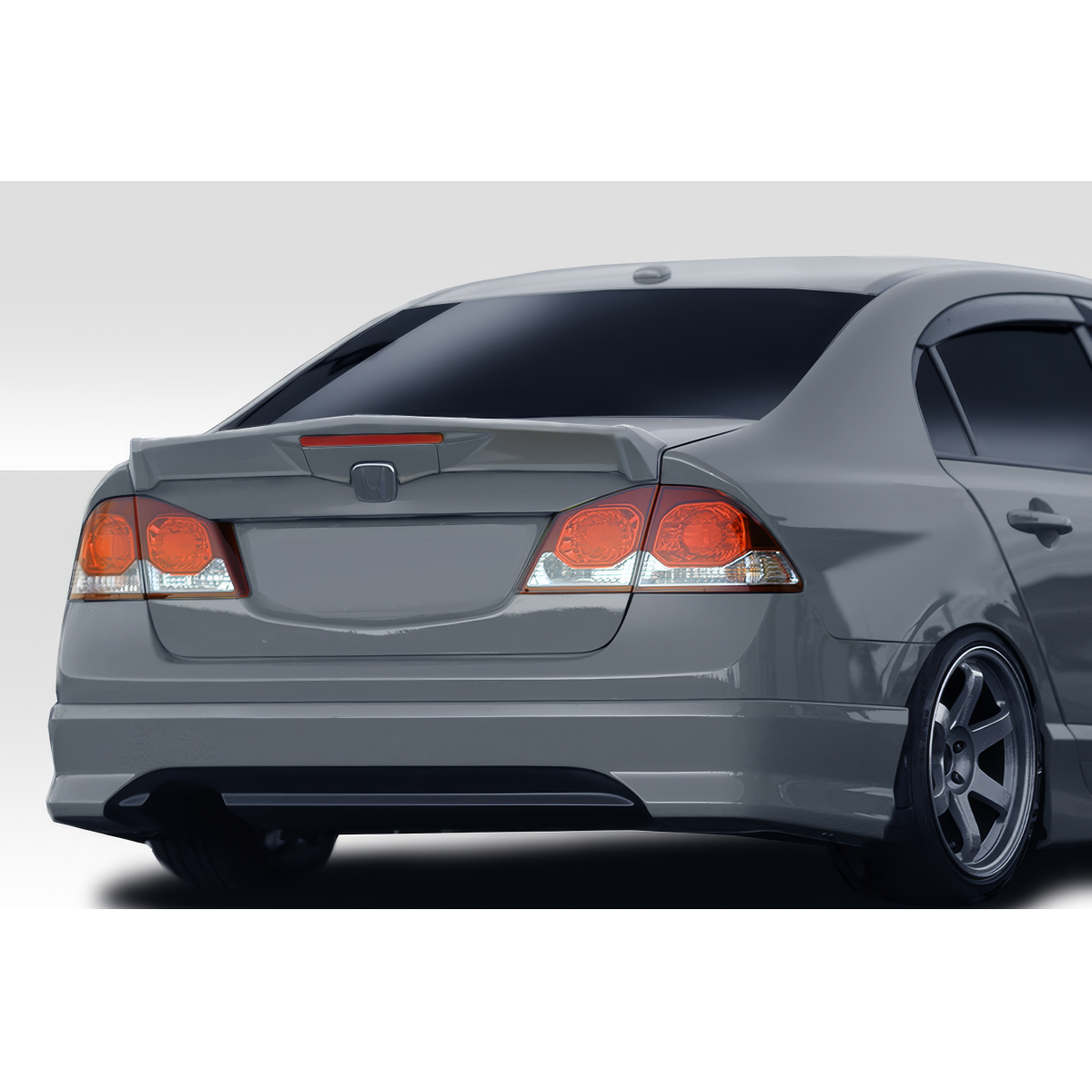 Modify your Honda Civic 2006 with our Exterior/Wings - Rear angle view of a Honda Civic