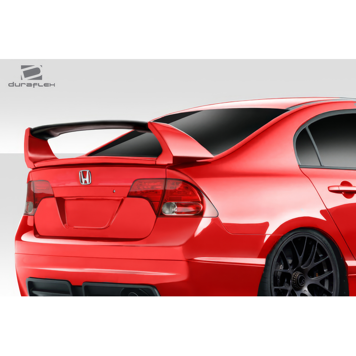 Modify your Honda Civic 2006 with our Exterior/Wings - Rear angle view of the vehicle showcasing the wing