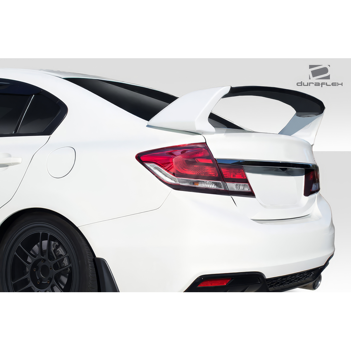 Modify your Honda Civic 2012 with our Exterior/Wings - Rear angle view of Honda Civic with wing spoiler