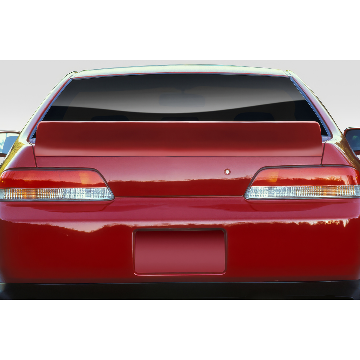 Modify your Honda Prelude 1997 with our Exterior/Wings - Rear angle view of a Honda Prelude spoiler