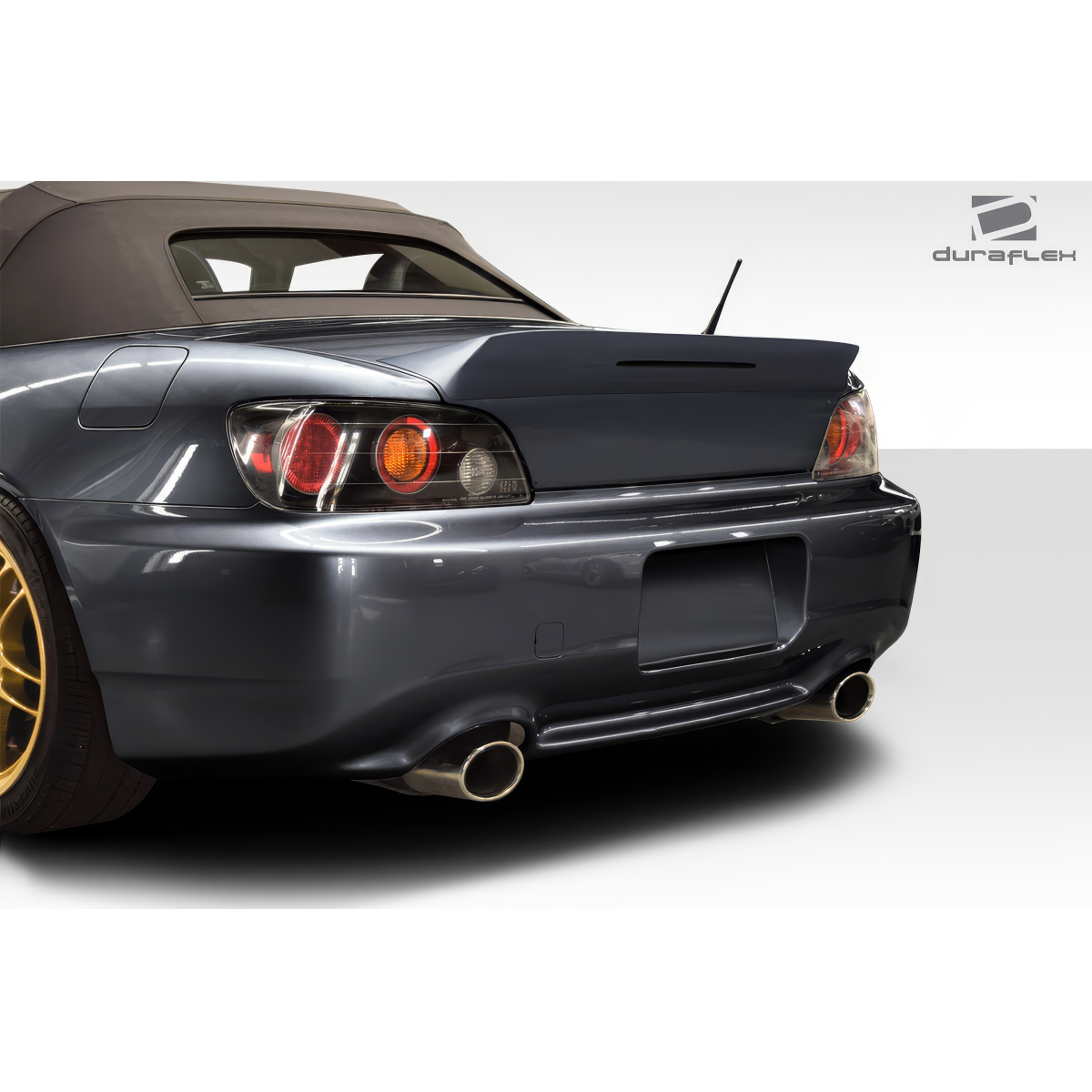 Modify your Honda S2000 2000 with our Exterior/Wings - View from a slight angle behind the vehicle