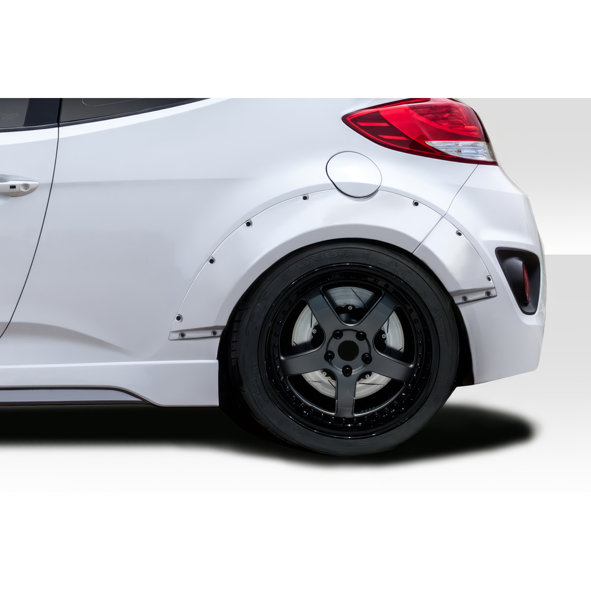 Modify your Hyundai Veloster 2012 with our Exterior/Fenders - Angled view of fender flare on rear of vehicle