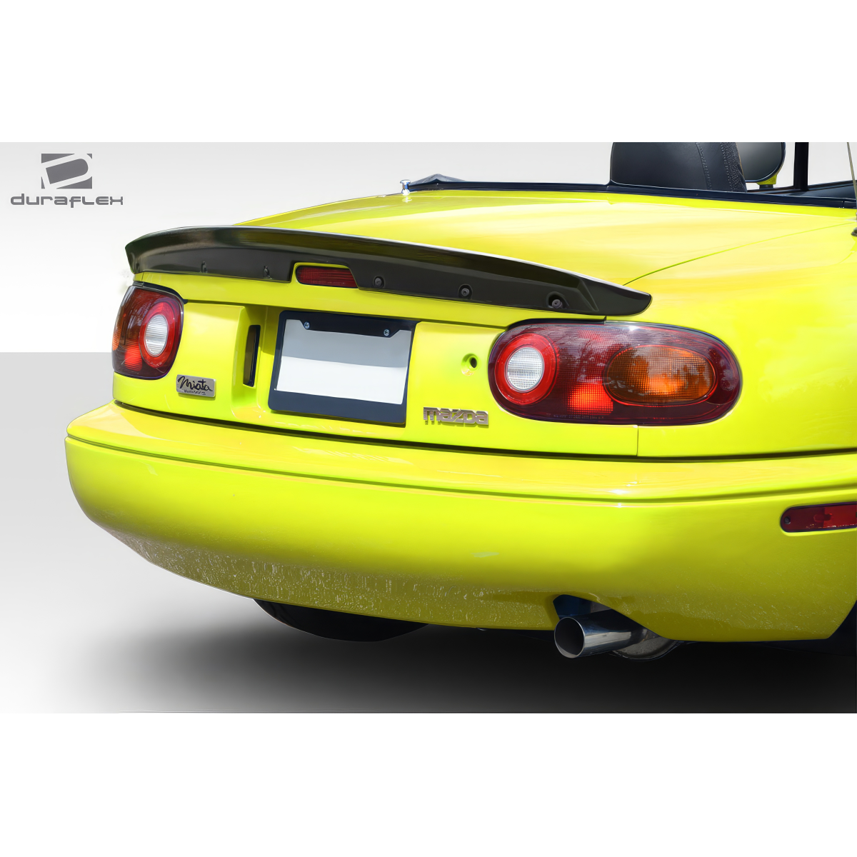 Modify your Mazda Miata 1990 with our Exterior/Wings - Rear view angle of Mazda Miata with spoiler