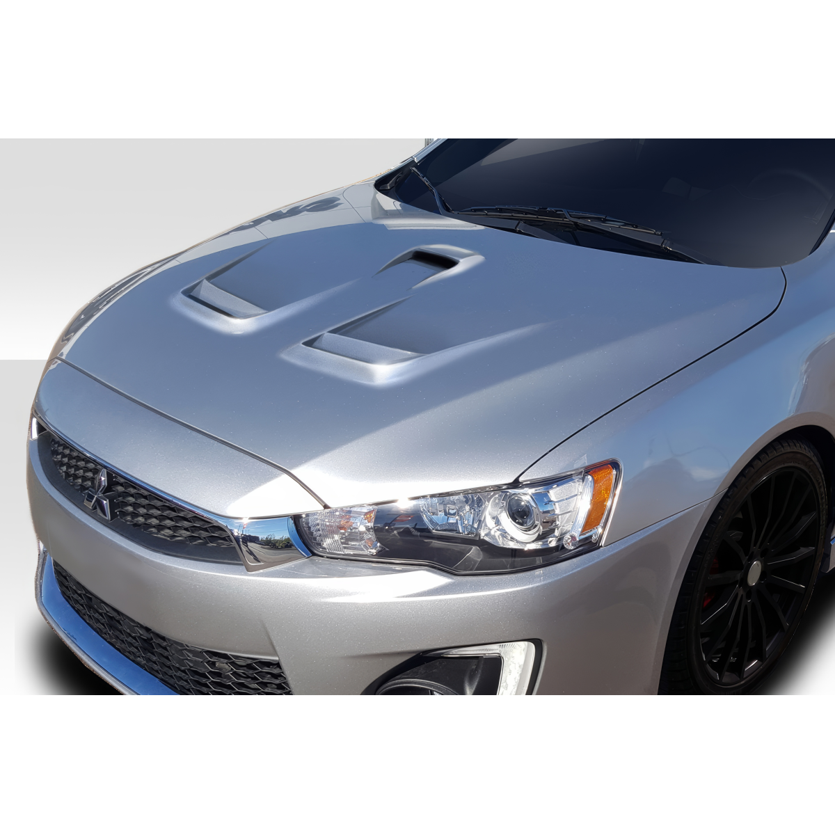 Modify your Mitsubishi Evolution 2008 with our Exterior/Hoods - Top angle view of the hood on the vehicle