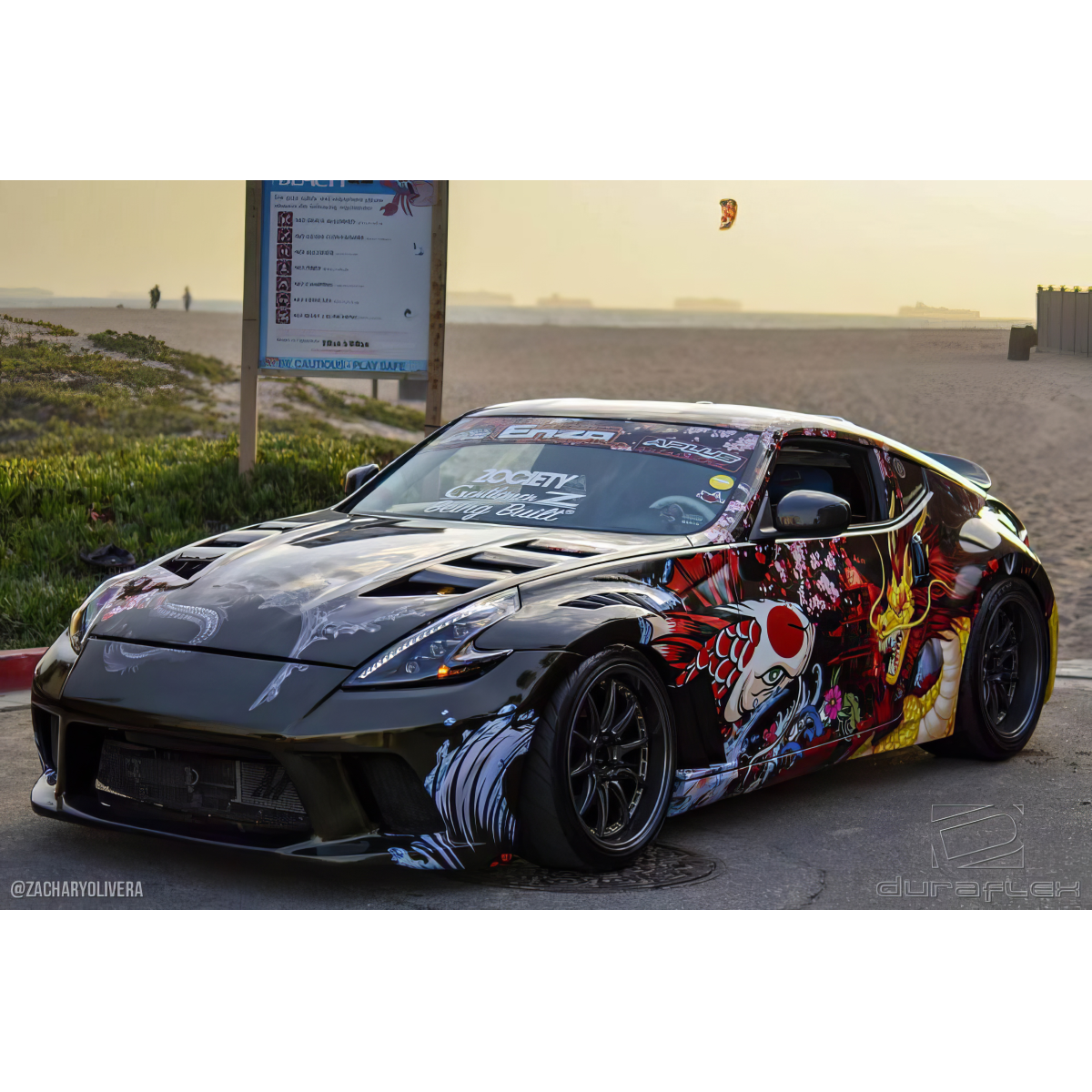 Modify your Nissan 370Z 2009 with our Exterior/Hoods - Front three quarter angle view of the vehicle