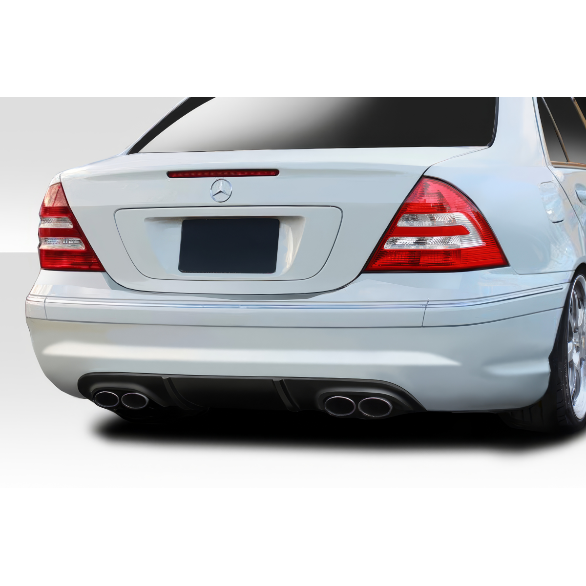 Modify your Mercedes-Benz C230 2001 with our Exterior/Diffusers - Rear angle view of vehicle showcasing rear diffuser