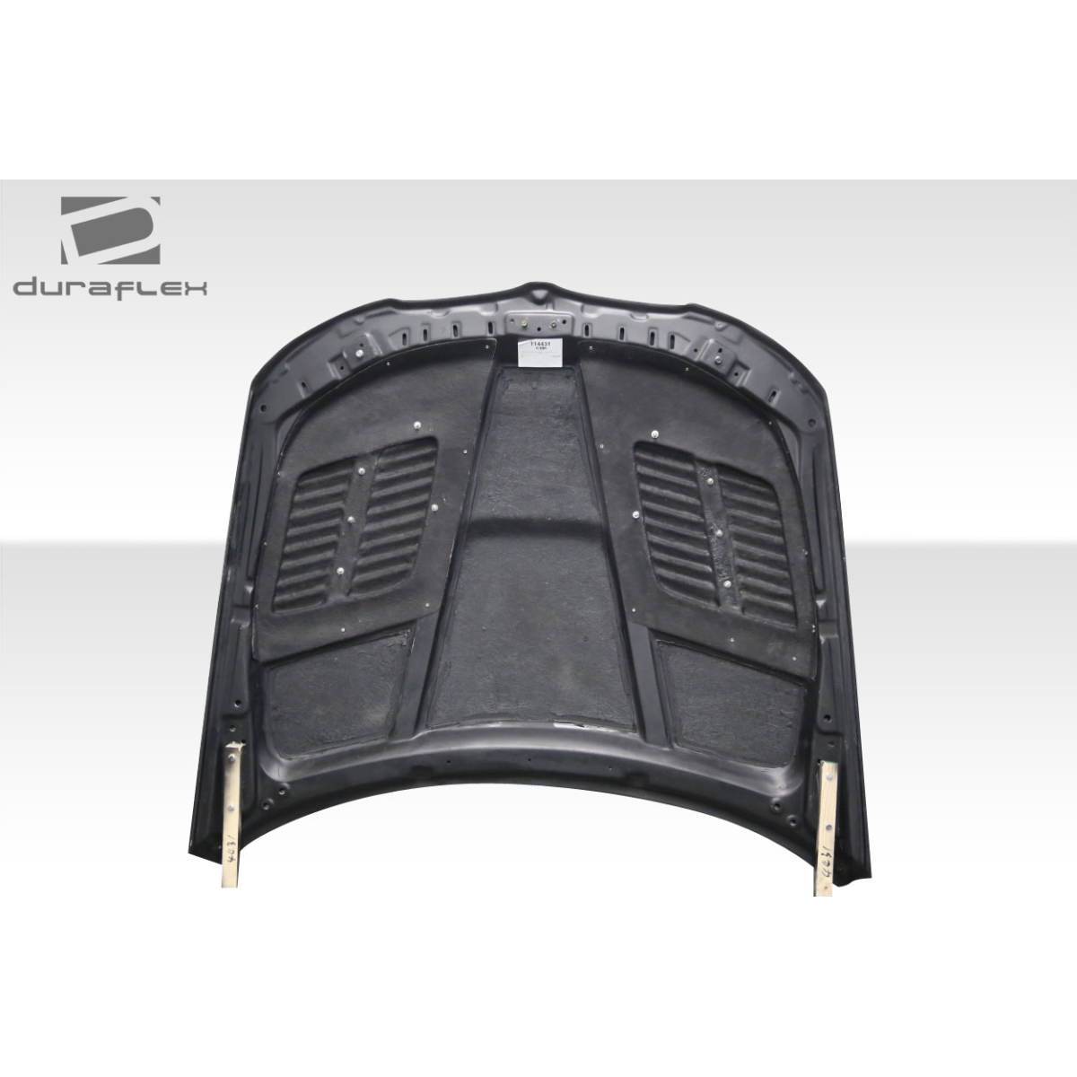 Modify your BMW 3-Series 2009 with our Exterior/Hoods - Angled view of a car hood from above