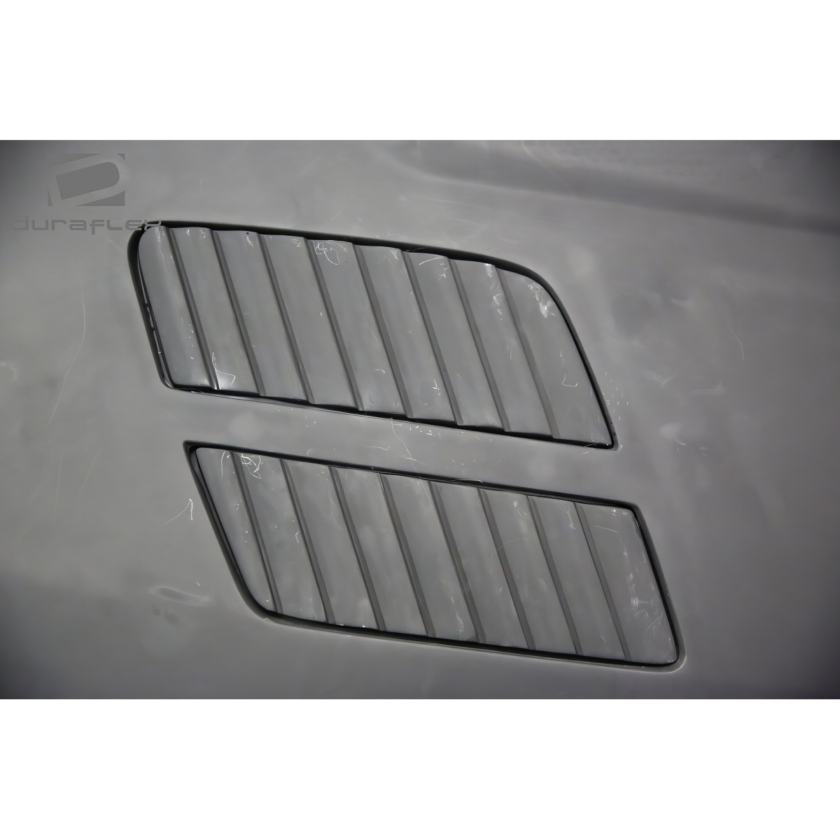 Modify your BMW 3-Series 2009 with our Exterior/Hoods - Frontal angle view of the hood vent part