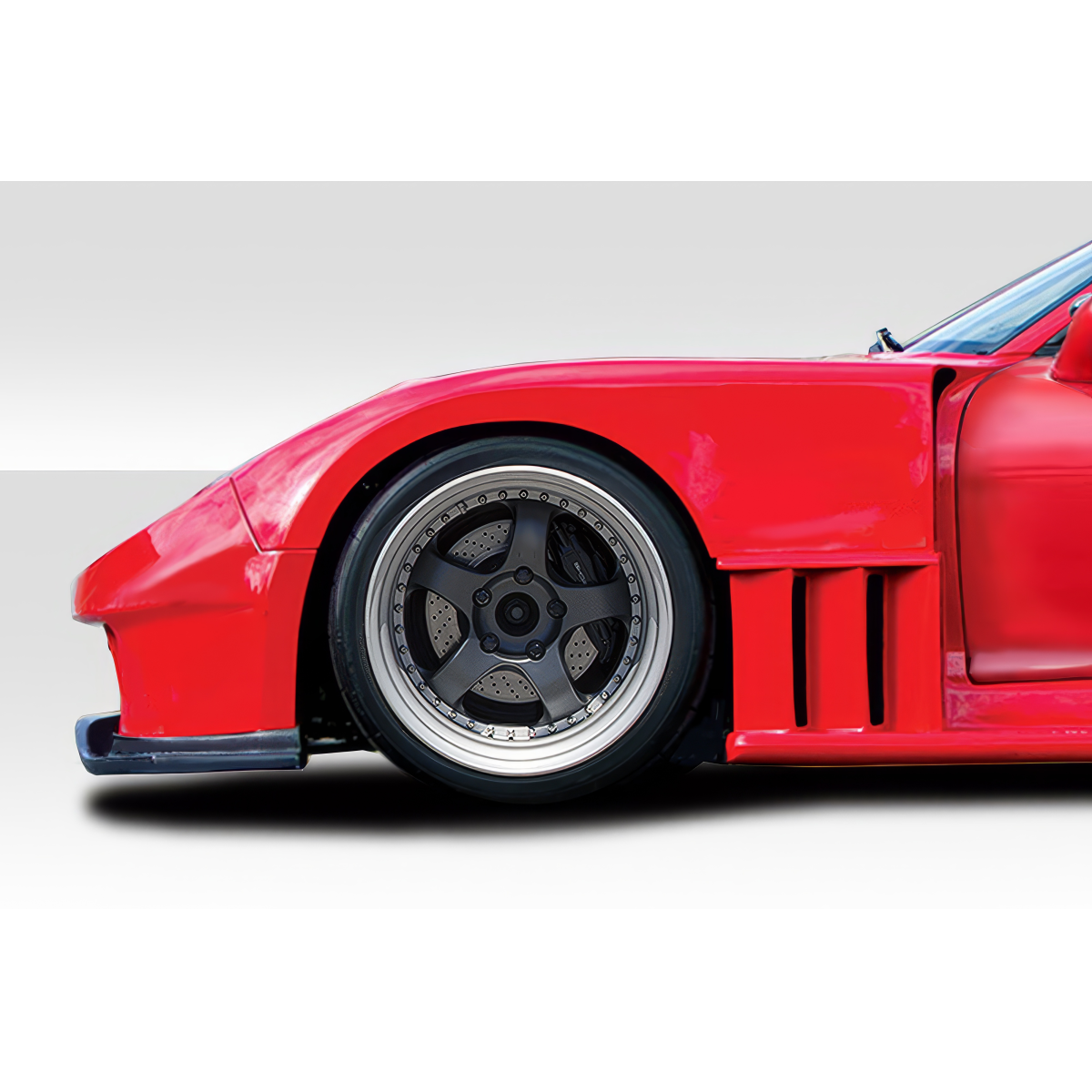 Modify your Mazda RX-7 1993 with our Exterior/Fenders - Side angle view of the fender and wheel