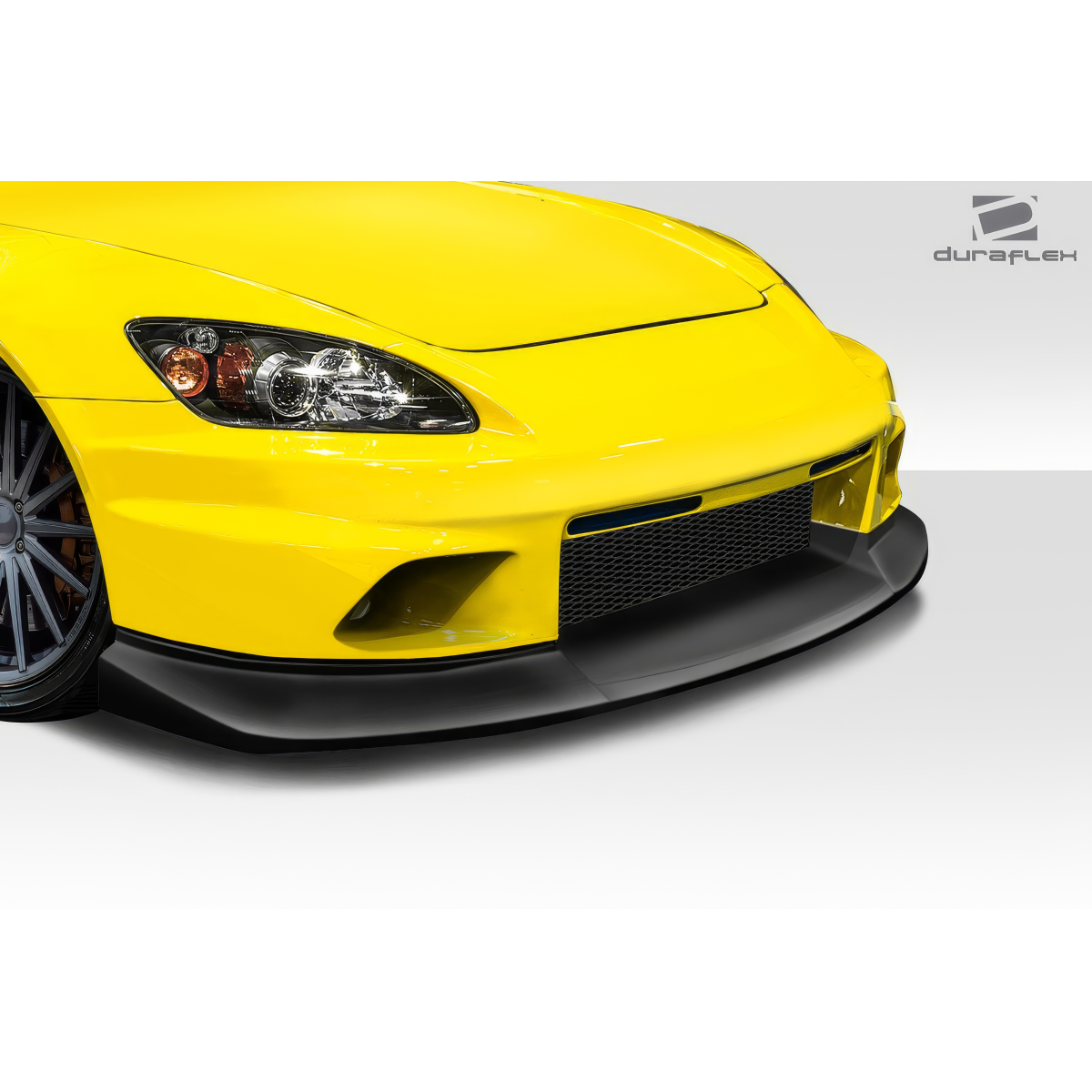 Modify your Honda S2000 2000 with our Exterior/Front Bumpers or Lips - Front view at a slight angle from the side