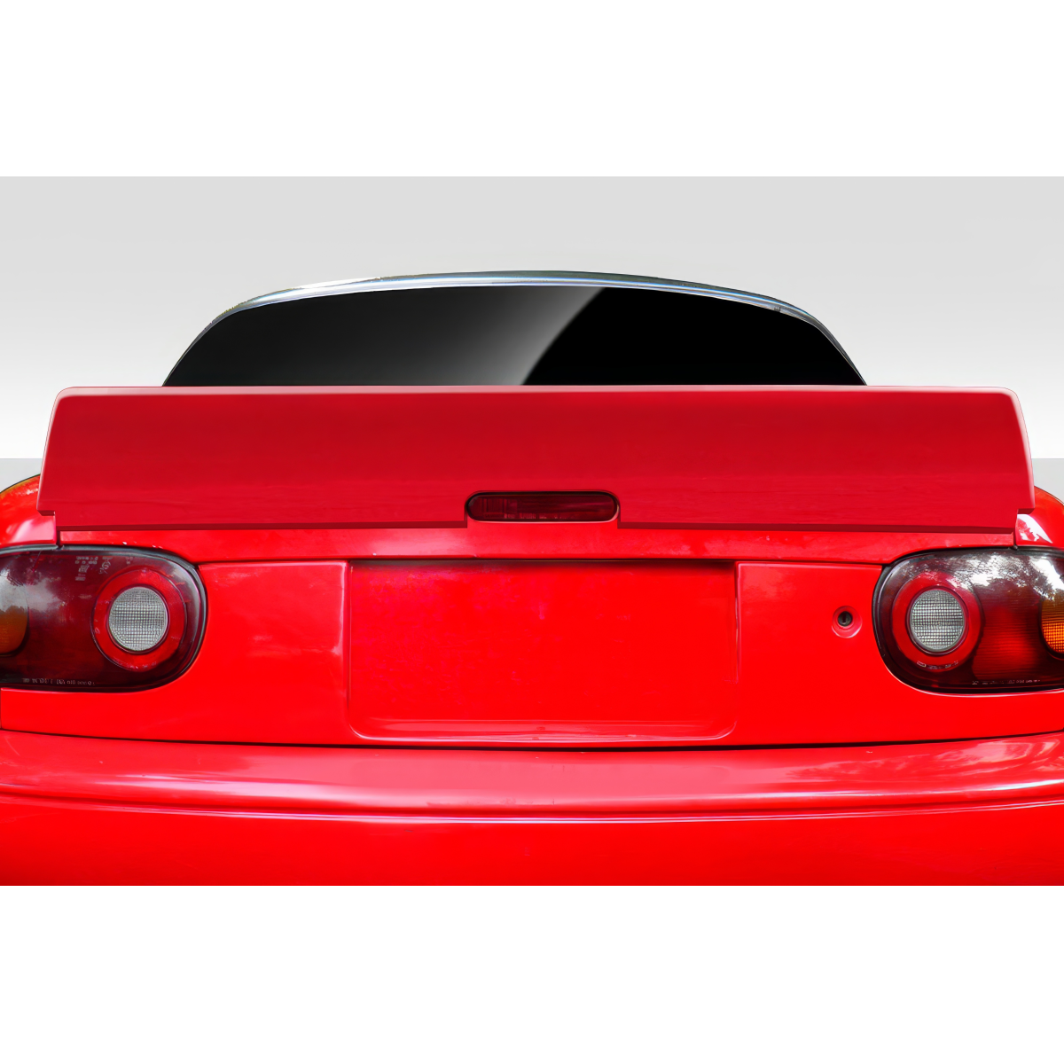 Modify your Mazda Miata 1990 with our Exterior/Wings - Rear view of a red Mazda Miata at slight angle