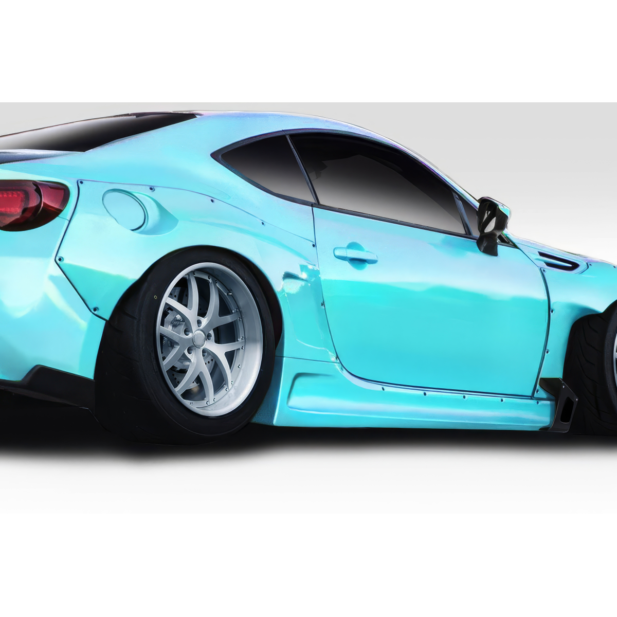 Modify your Subaru BRZ 2013 with our Exterior/Side Skirts - The image shows the side of a car angled from behind