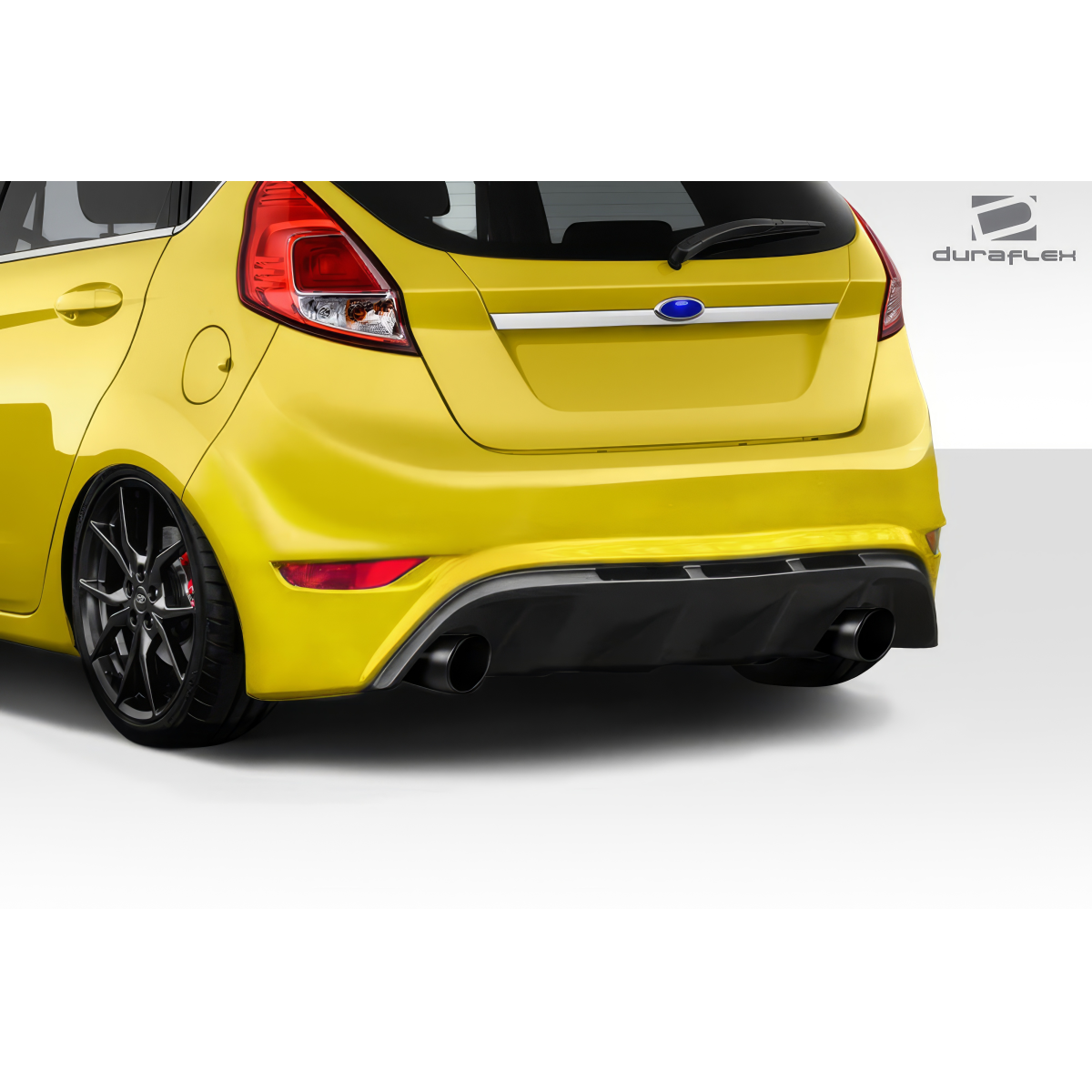 Modify your Ford Fiesta 2014 with our Exterior/Rear Bumpers or Lips - Angled view of rear bumper showing design features