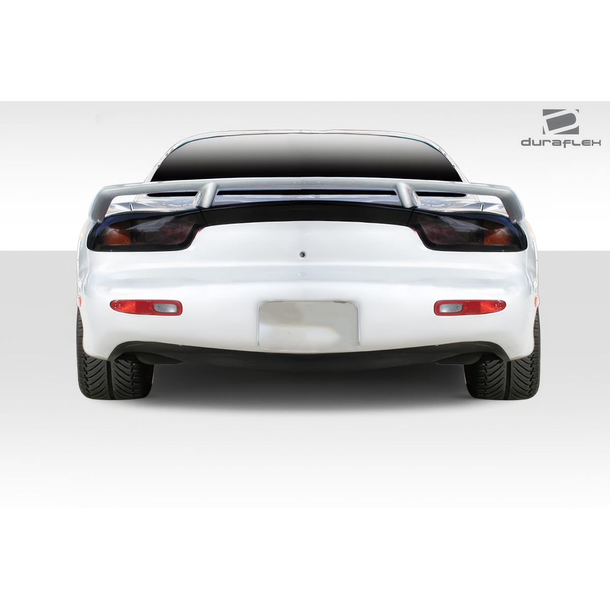 Modify your Mazda RX-7 1993 with our Exterior/Wings - Rear view angle of a car part spoiler