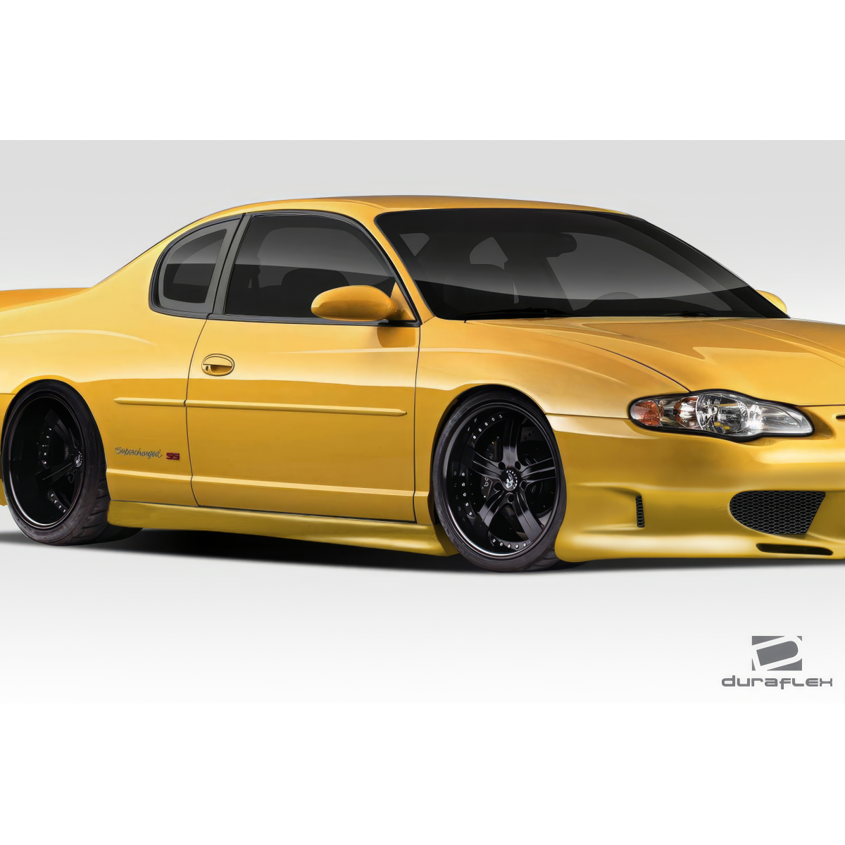 Modify your Chevrolet Monte Carlo 2000 with our Exterior/Side Skirts - Three quarter view of modified yellow car