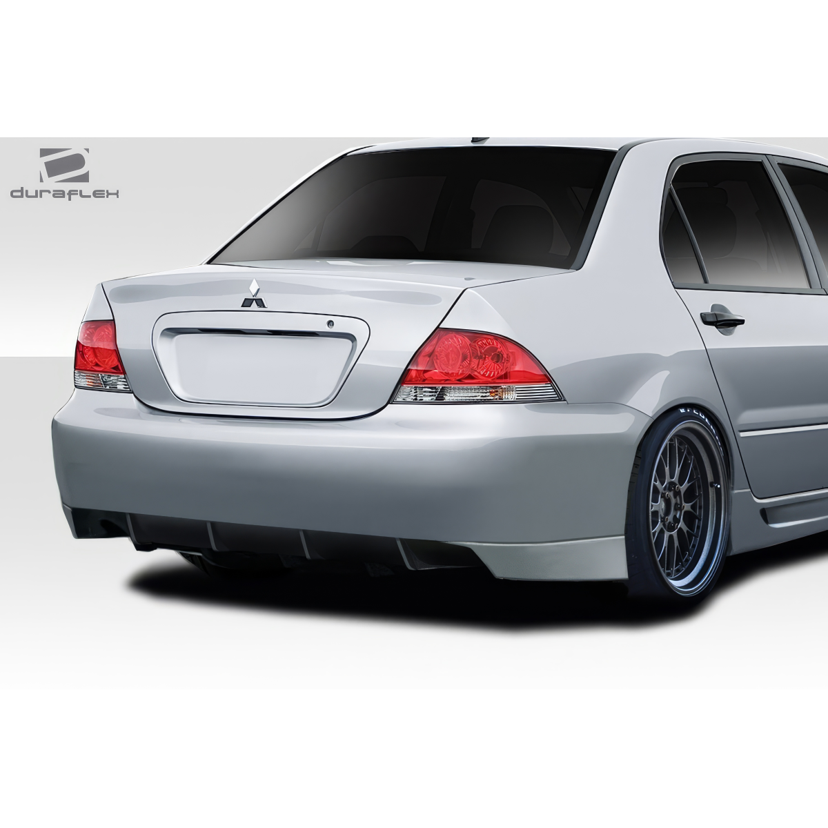 Modify your Mitsubishi Lancer 2004 with our Exterior/Rear Bumpers or Lips - Image shows rear view slightly angled to the left