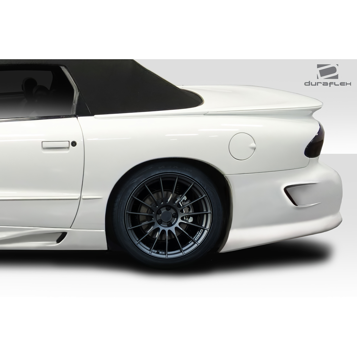 Modify your Pontiac Firebird 1998 with our Exterior/Complete Body Kits - Side view at a slight angle showing rear bumper