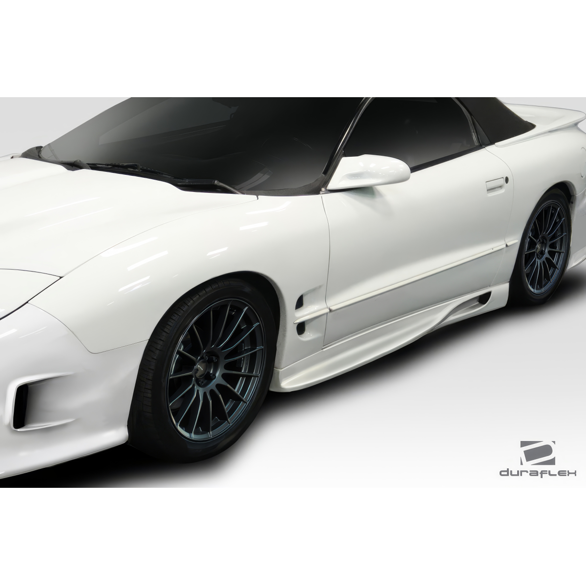 Modify your Pontiac Firebird 1998 with our Exterior/Complete Body Kits - Showcasing side skirts at a three quarter angle