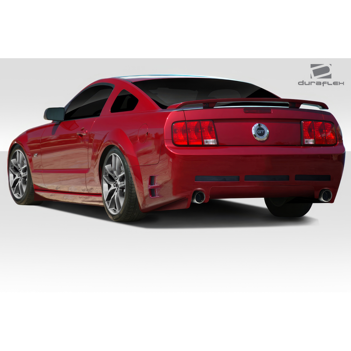 Modify your Ford Mustang 2005 with our Exterior/Complete Body Kits - Rear angle view of a modified red Mustang