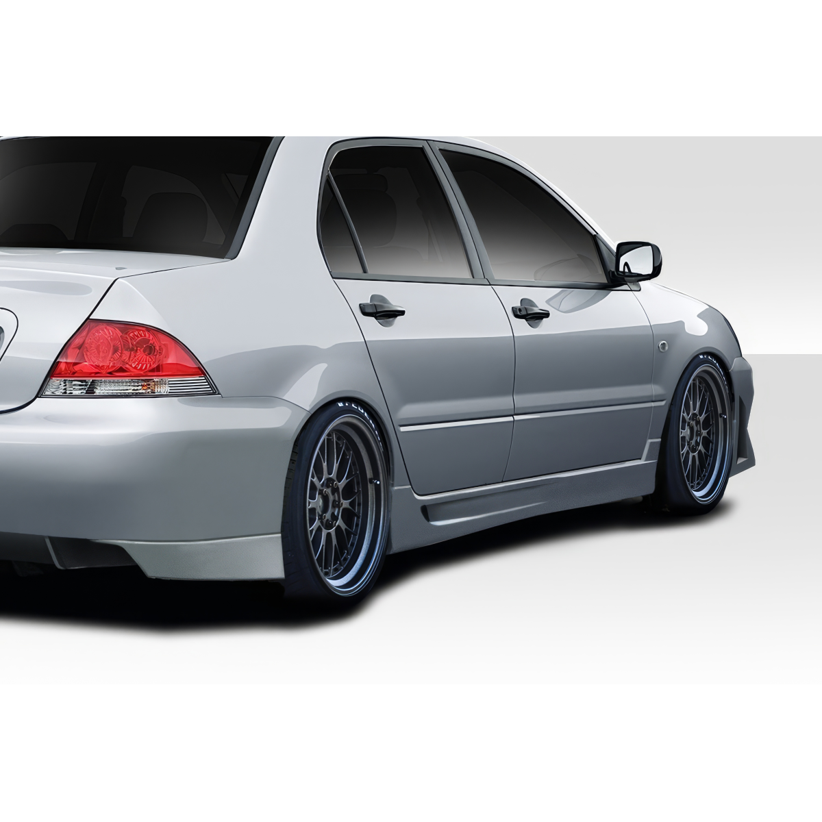 Modify your Mitsubishi Lancer 2004 with our Exterior/Complete Body Kits - Side angle view of a Mitsubishi Lancer