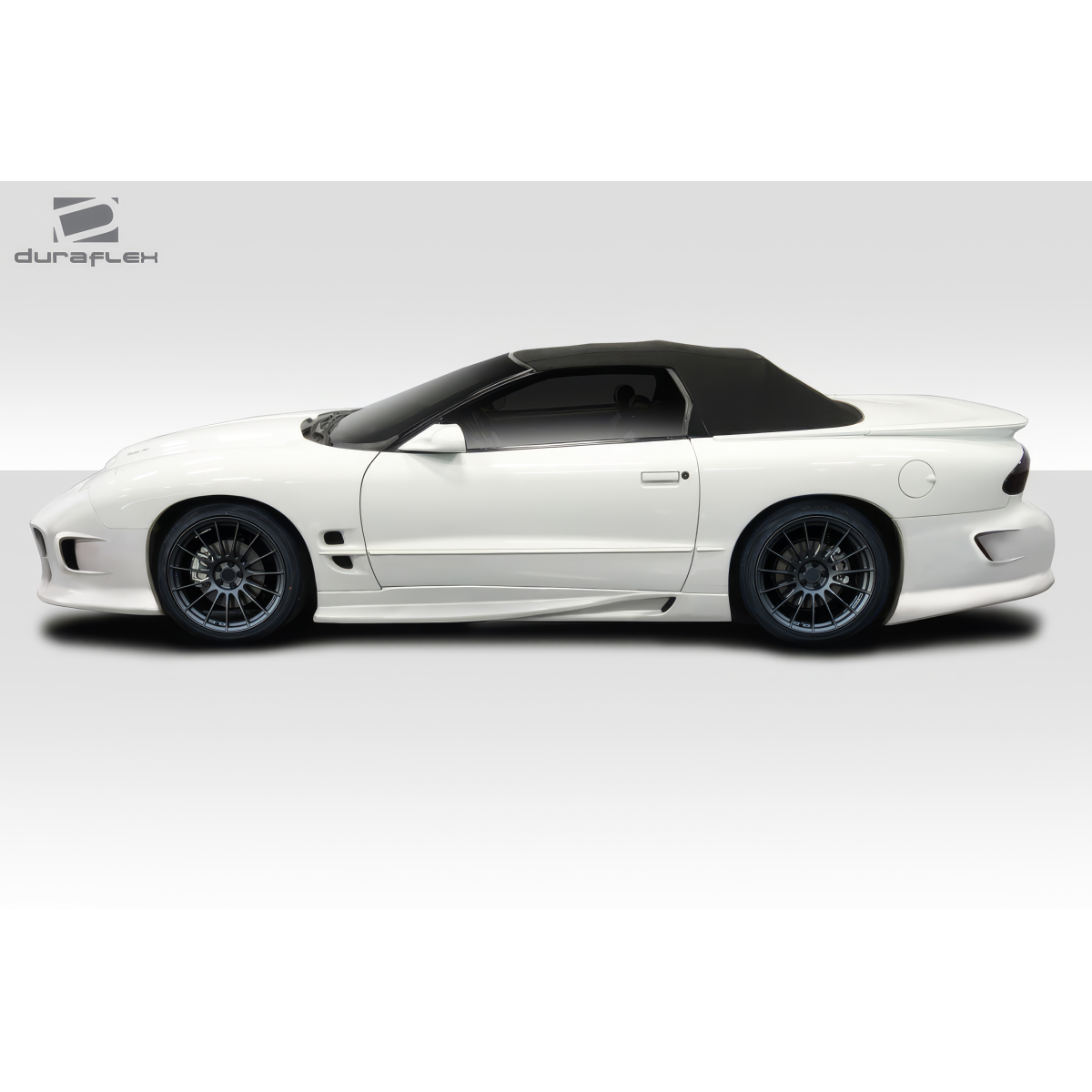 Modify your Pontiac Firebird 1998 with our Exterior/Complete Body Kits - Side view of the vehicle at a profile angle