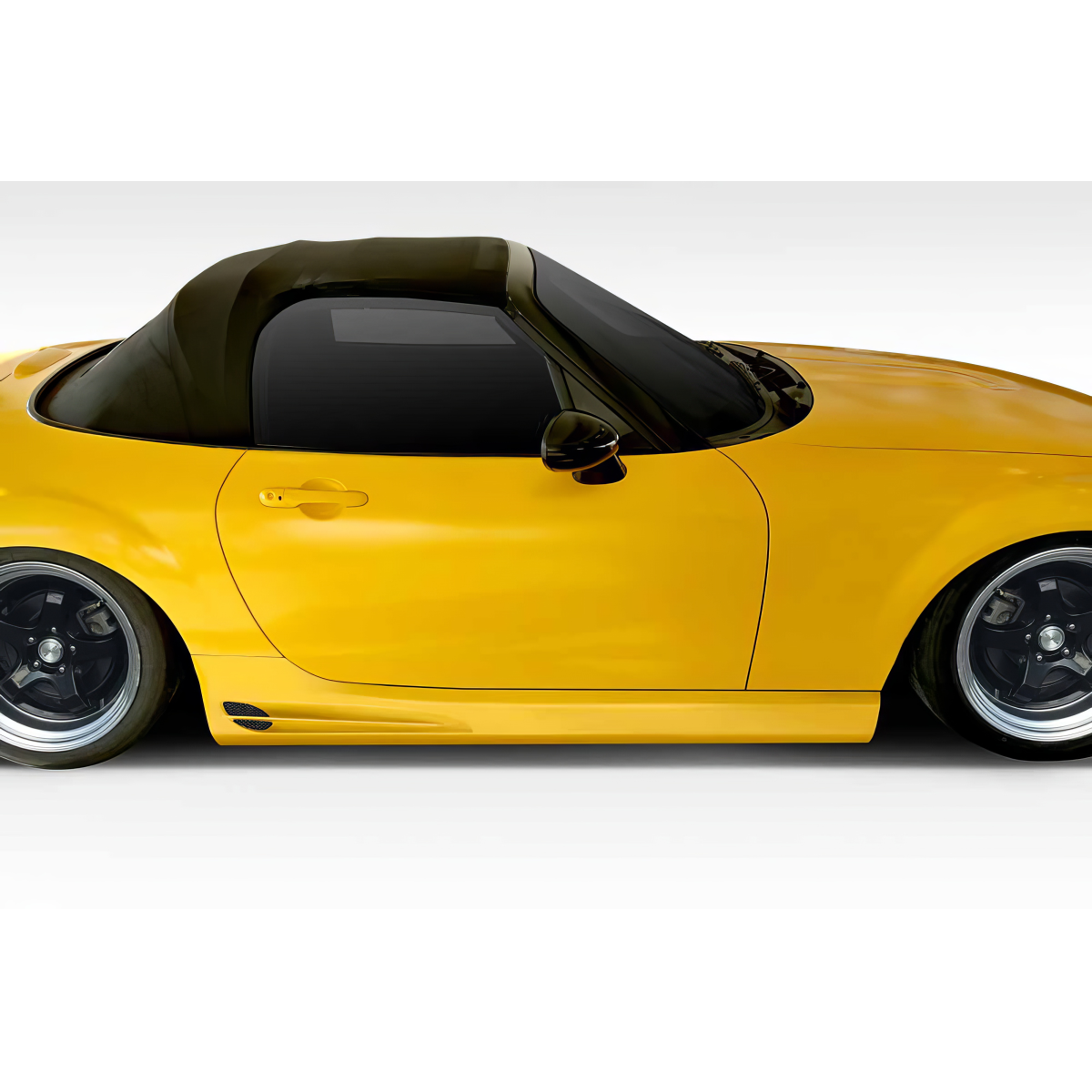 Modify your Mazda Miata 2006 with our Exterior/Side Skirts - Side view of Mazda Miata with lowered stance