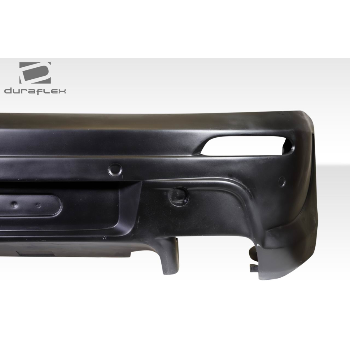 Modify your BMW 6-Series 2004 with our Exterior/Rear Bumpers or Lips - Angle showing side profile of rear bumper part