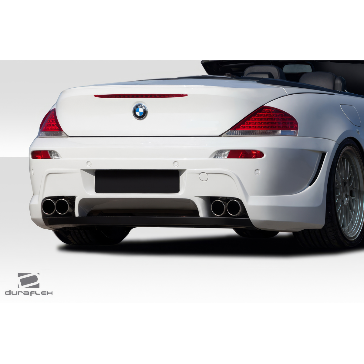 Modify your BMW 6-Series 2004 with our Exterior/Rear Bumpers or Lips - Rear view angle of the vehicle showing the bumper