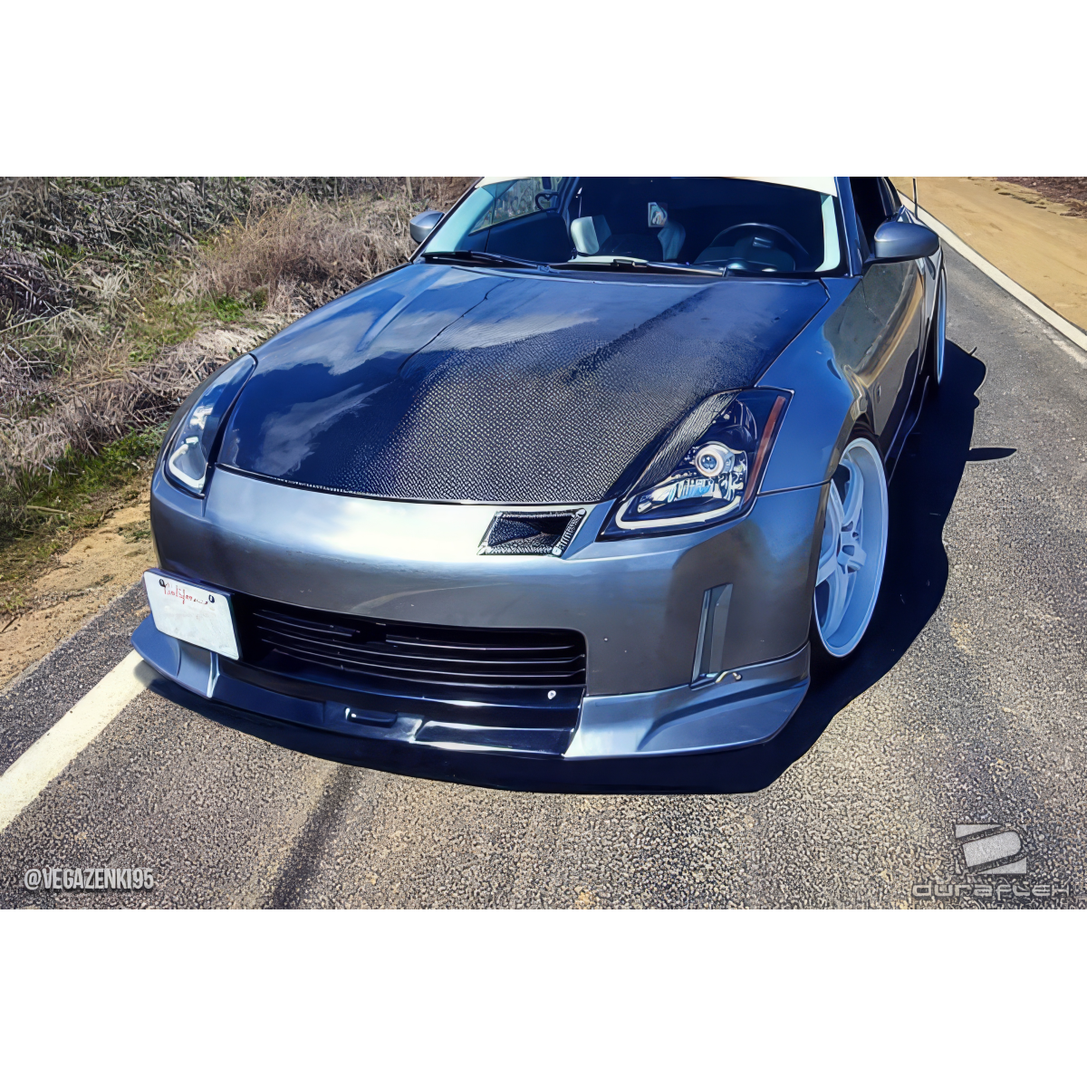 Modify your Nissan 350Z 2003 with our Exterior/Front Bumpers or Lips - Front angle view of Nissan 350Z with lip spoiler