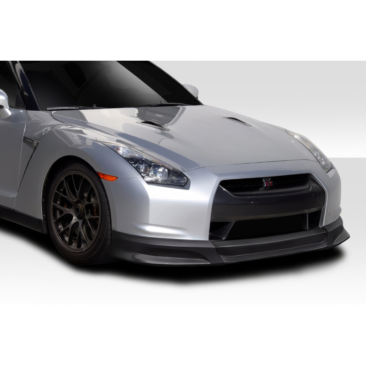 Modify your Nissan GT-R 2009 with our Exterior/Front Bumpers or Lips - Front angle of vehicle showing body kit part