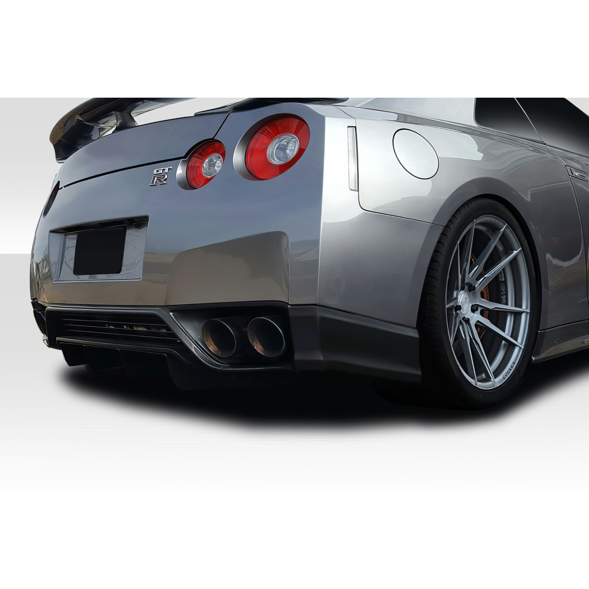 Modify your Nissan GT-R 2009 with our Exterior/Rear Bumpers or Lips - Low angle rear view of vehicle