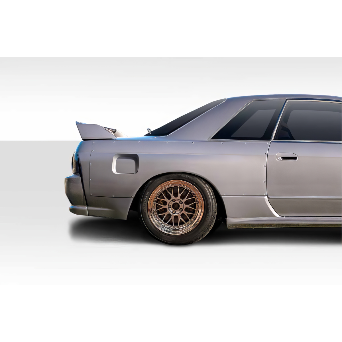 Modify your Nissan Skyline 1989 with our Exterior/Fenders - Side angle view of rear fender flares