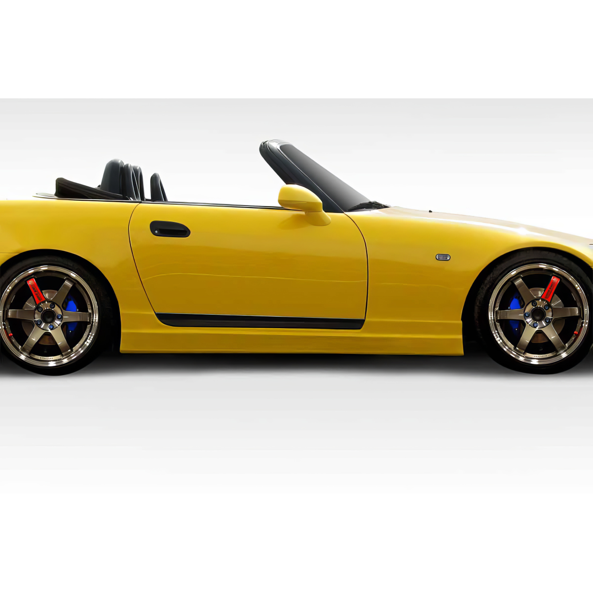 Modify your Honda S2000 2000 with our Exterior/Side Skirts - Side view of car at slight angle to highlight skirts