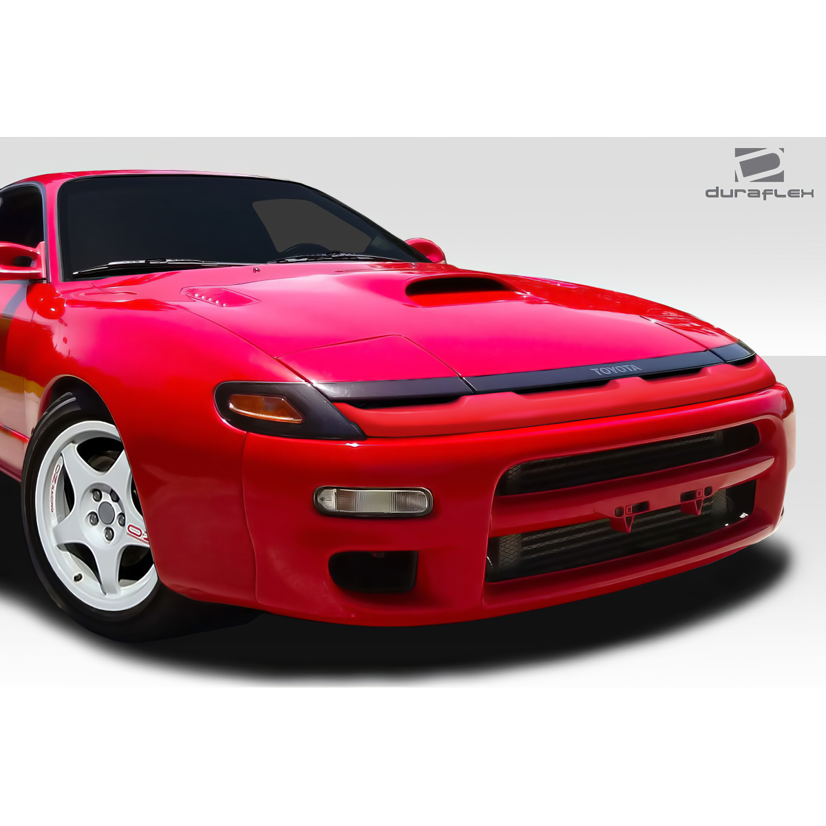 Modify your Toyota Celica 1990 with our Exterior/Grilles - Front angle view of vehicle grille part