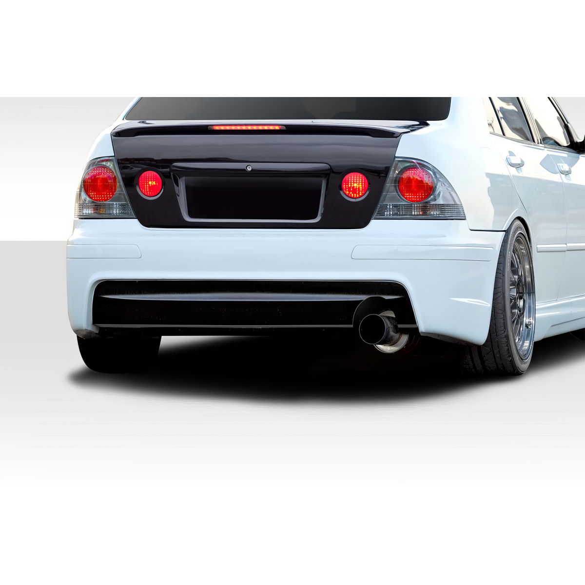 Modify your Lexus IS Series 2000 with our Exterior/Rear Bumpers or Lips - Image shows rear view at eye level angle