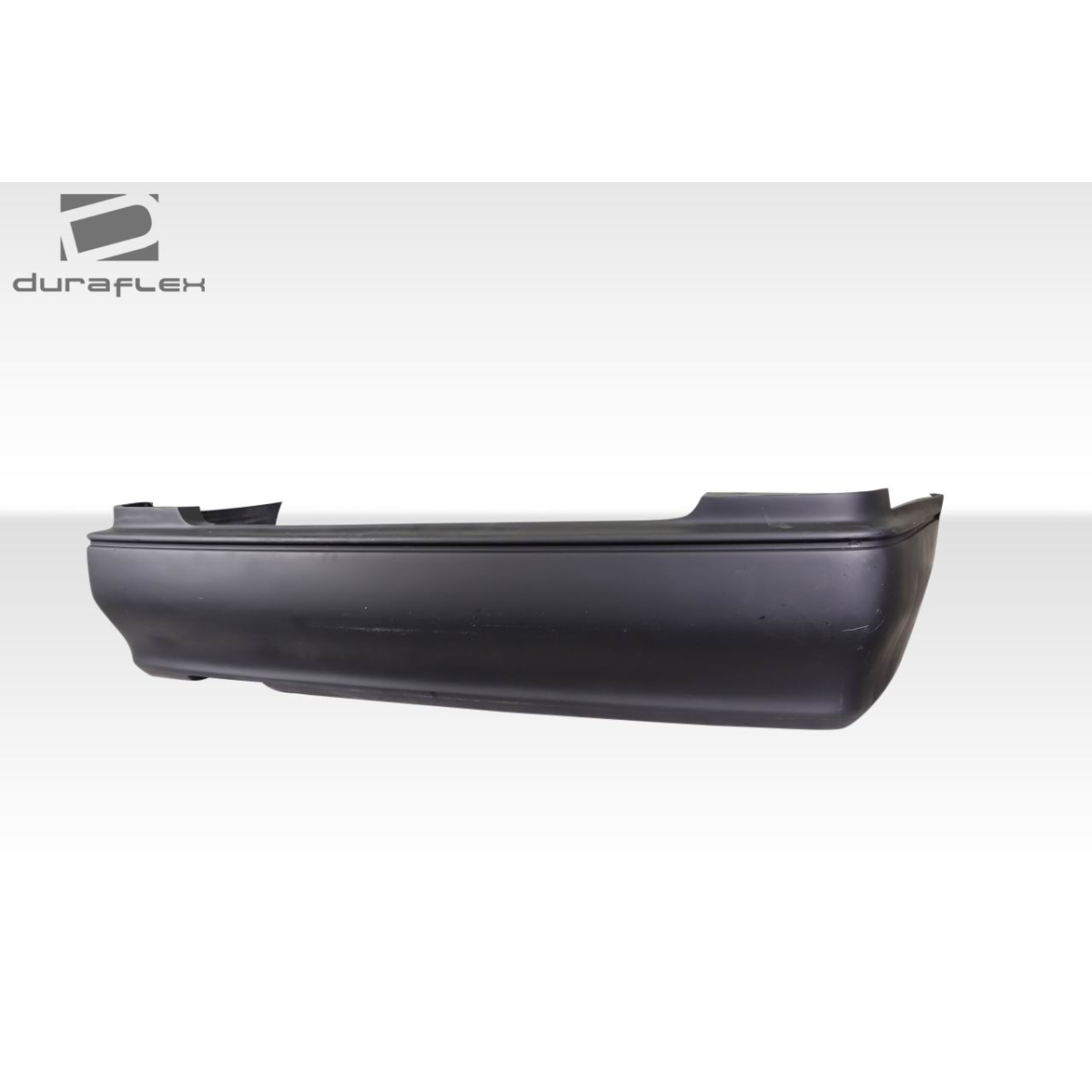 Modify your Infiniti J 1997 with our Exterior/Rear Bumpers or Lips - Side angle view of rear bumper part