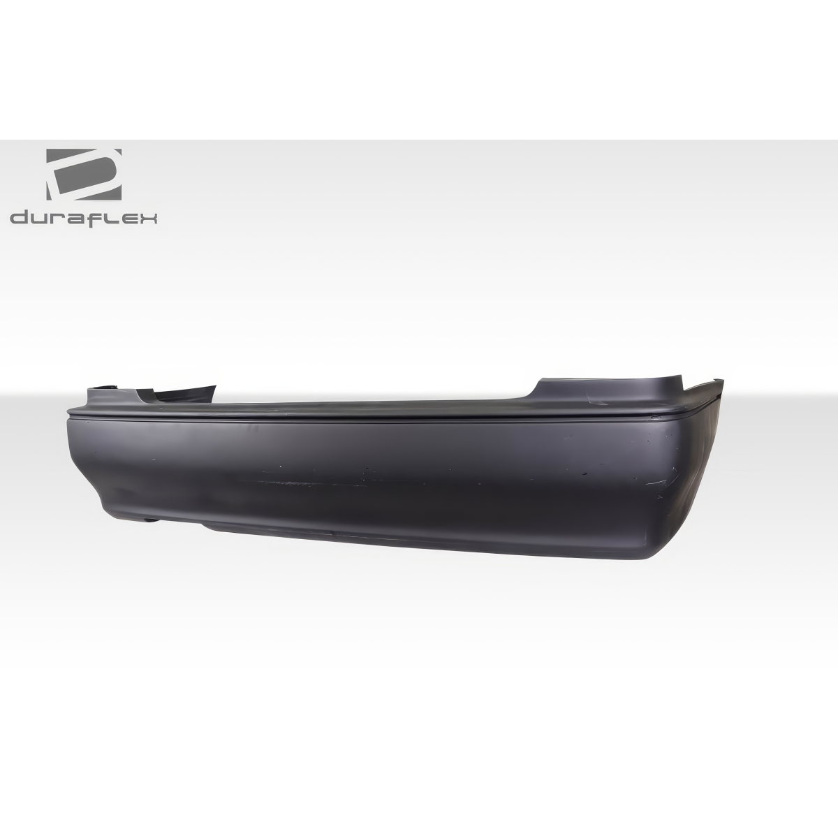 Modify your Infiniti J 1997 with our Exterior/Rear Bumpers or Lips - Side view of rear bumper at a slight angle