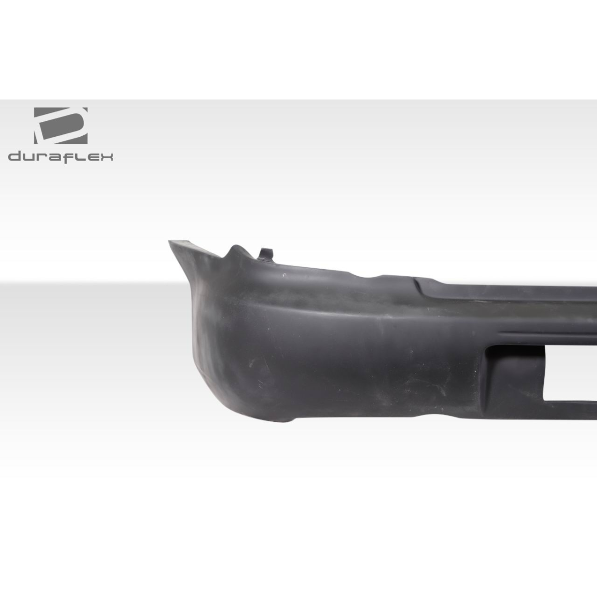 Modify your Subaru Impreza 2004 with our Exterior/Rear Bumpers - Side view of the rear bumper part