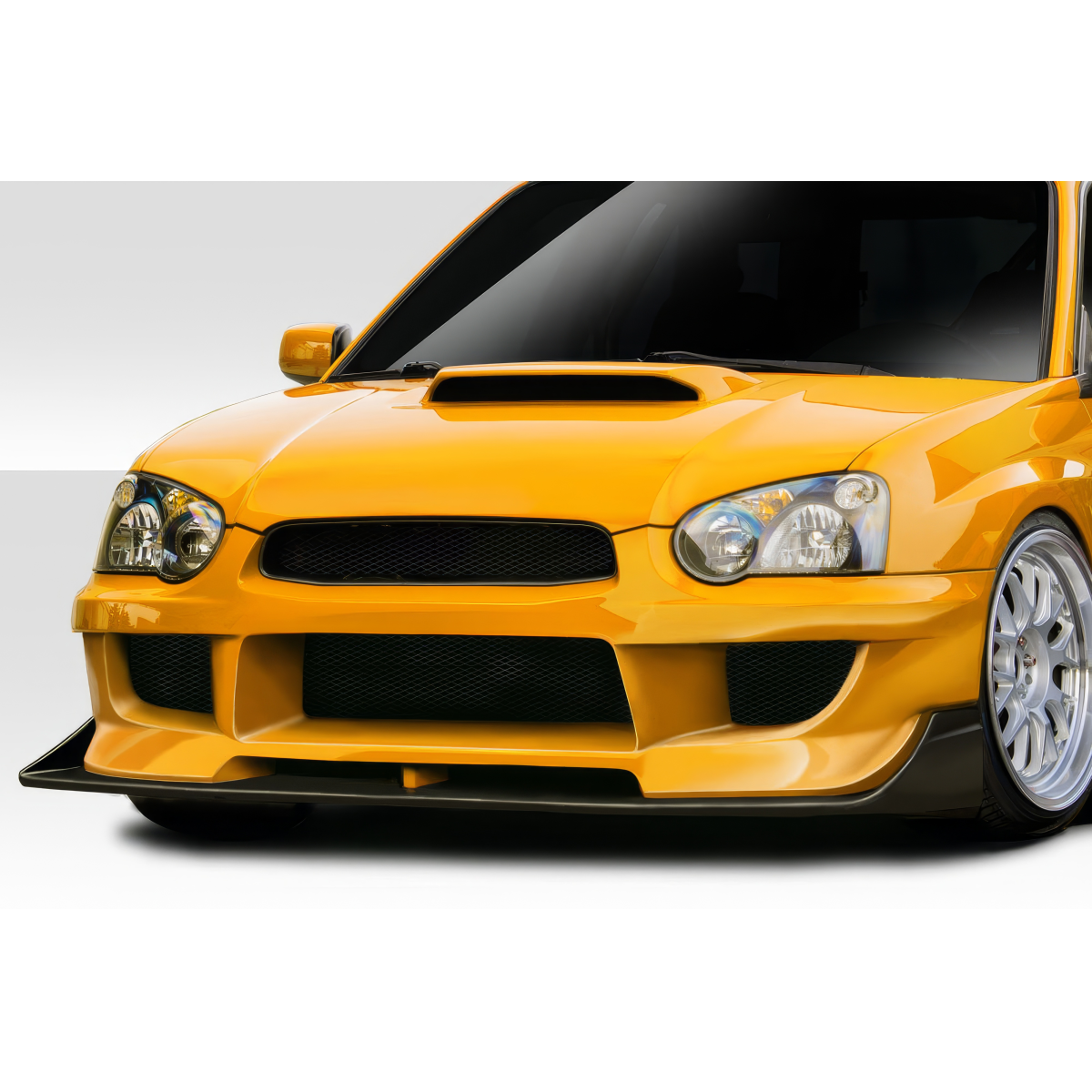 Modify your Subaru Impreza 2004 with our Exterior/Front Bumpers - Frontal view of the vehicle at a close angle