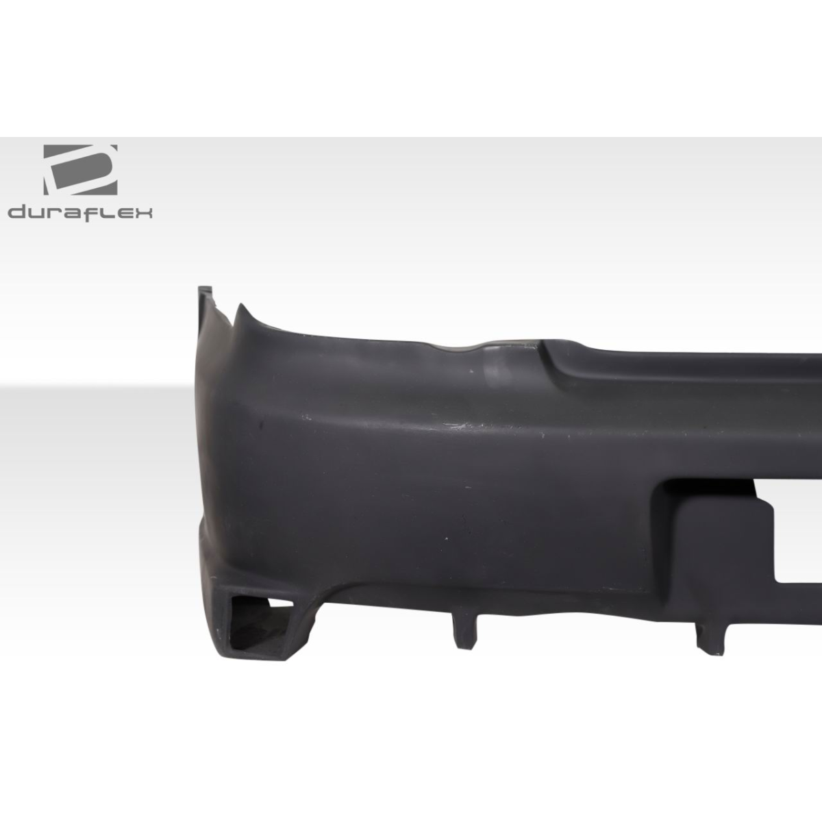 Modify your Subaru Impreza 2004 with our Exterior/Rear Bumpers - Side view of the rear bumper part
