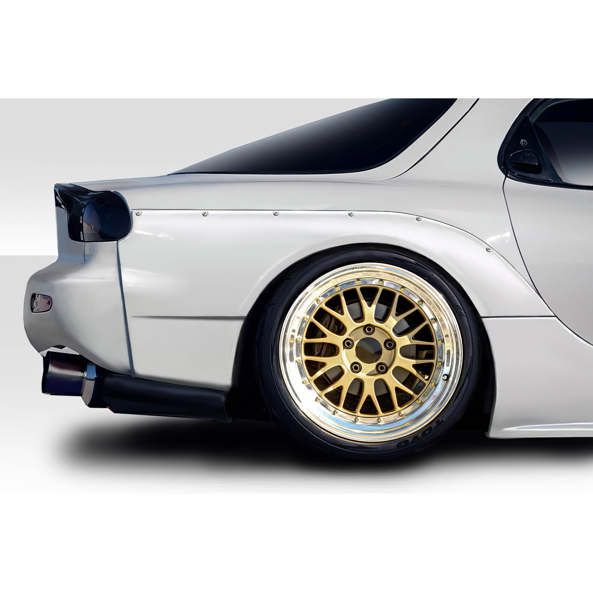 Modify your Mazda RX-7 1993 with our Exterior/Fenders - The image shows the rear angle of a Mazda RX-7