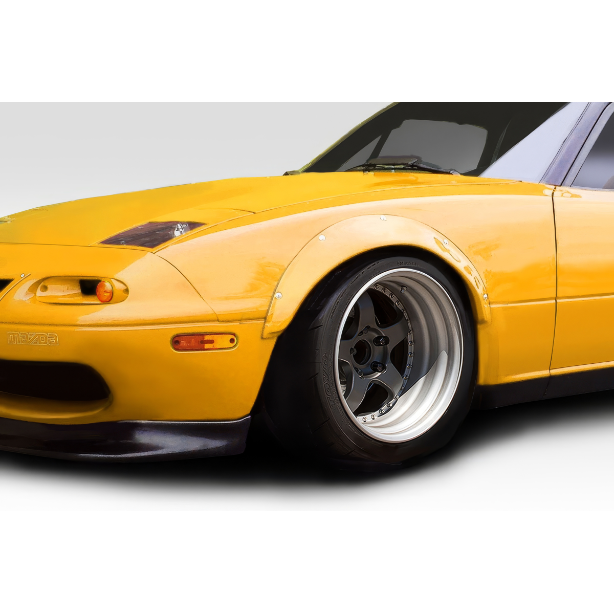 Modify your Mazda Miata 1990 with our Exterior/Fenders - Front three quarter view of vehicle fender