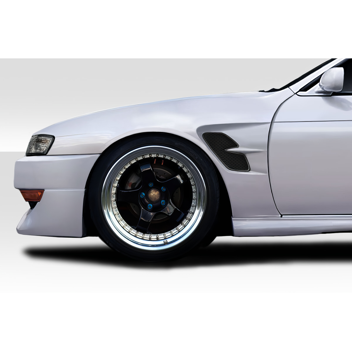 Modify your Nissan 240SX 1997 with our Exterior/Fenders - Side view at slight angle displaying fender and wheel