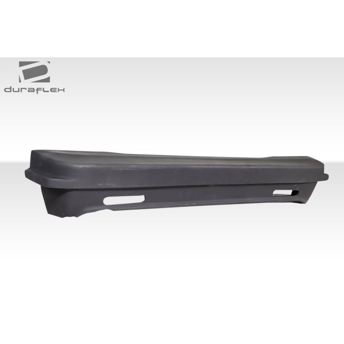 Modify your Mazda RX-7 1986 with our Exterior/Rear Bumpers or Lips - Side angle of the rear bumper part