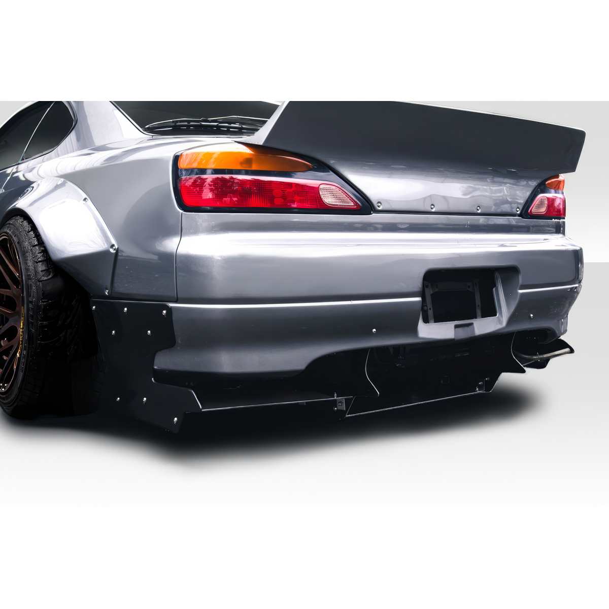 Modify your Nissan Silvia 1999 with our Exterior/Diffusers - Rear angle view showing diffuser on vehicle