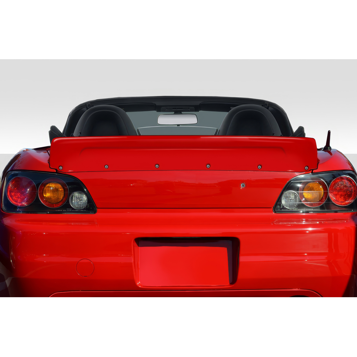 Modify your Honda S2000 2000 with our Exterior/Wings - Rear angle view of a red Honda S2000 vehicle