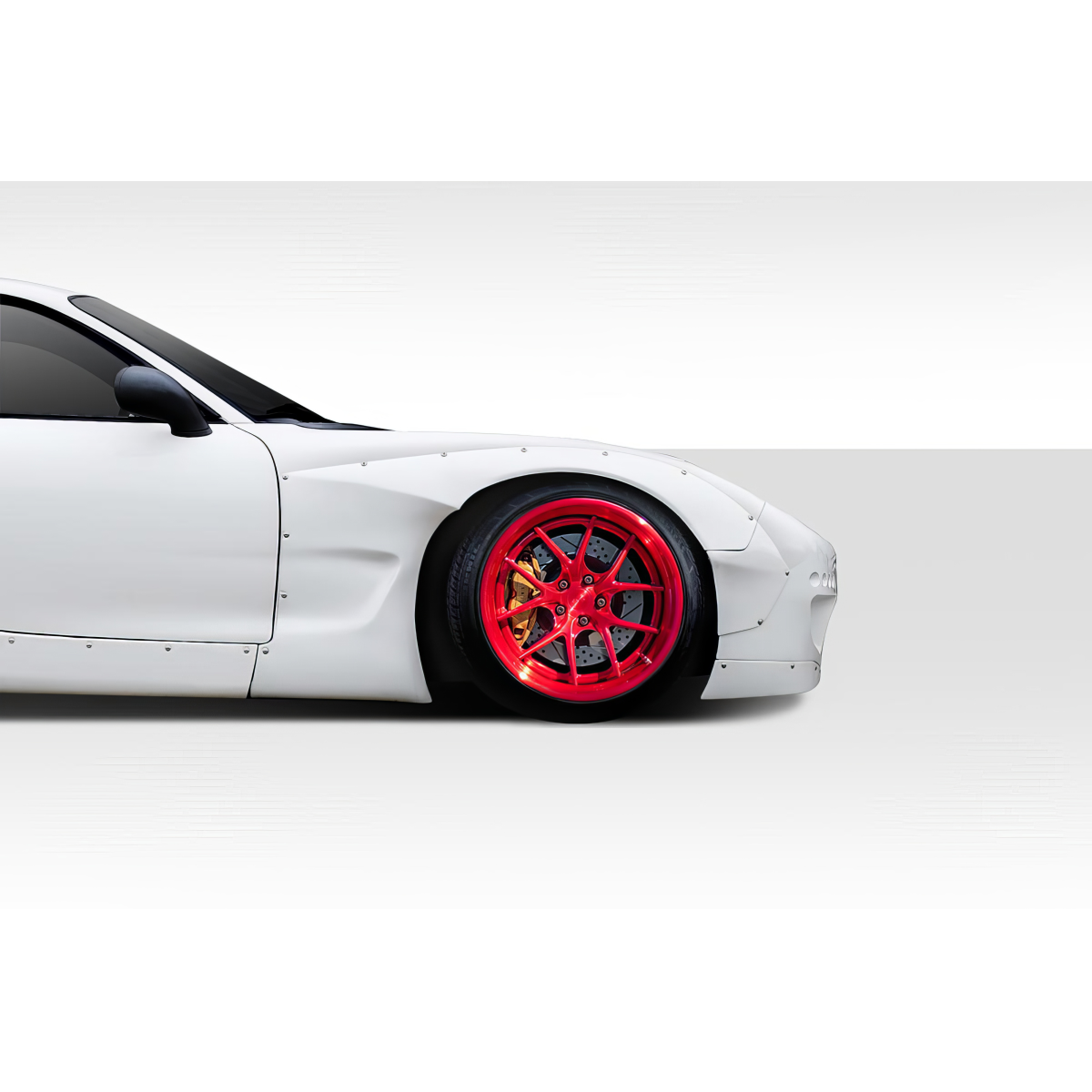 Modify your Mazda RX-7 1993 with our Exterior/Fenders - Side angle view of Mazda RX-7 showcasing fender design