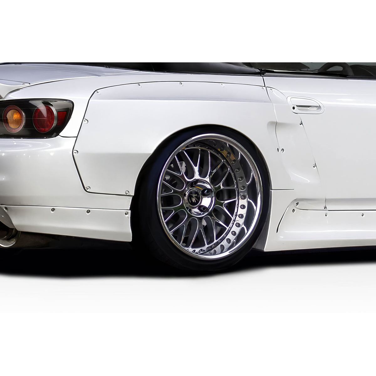 Modify your Honda S2000 2000 with our Exterior/Fenders - Side angle focusing on rear fender and wheel