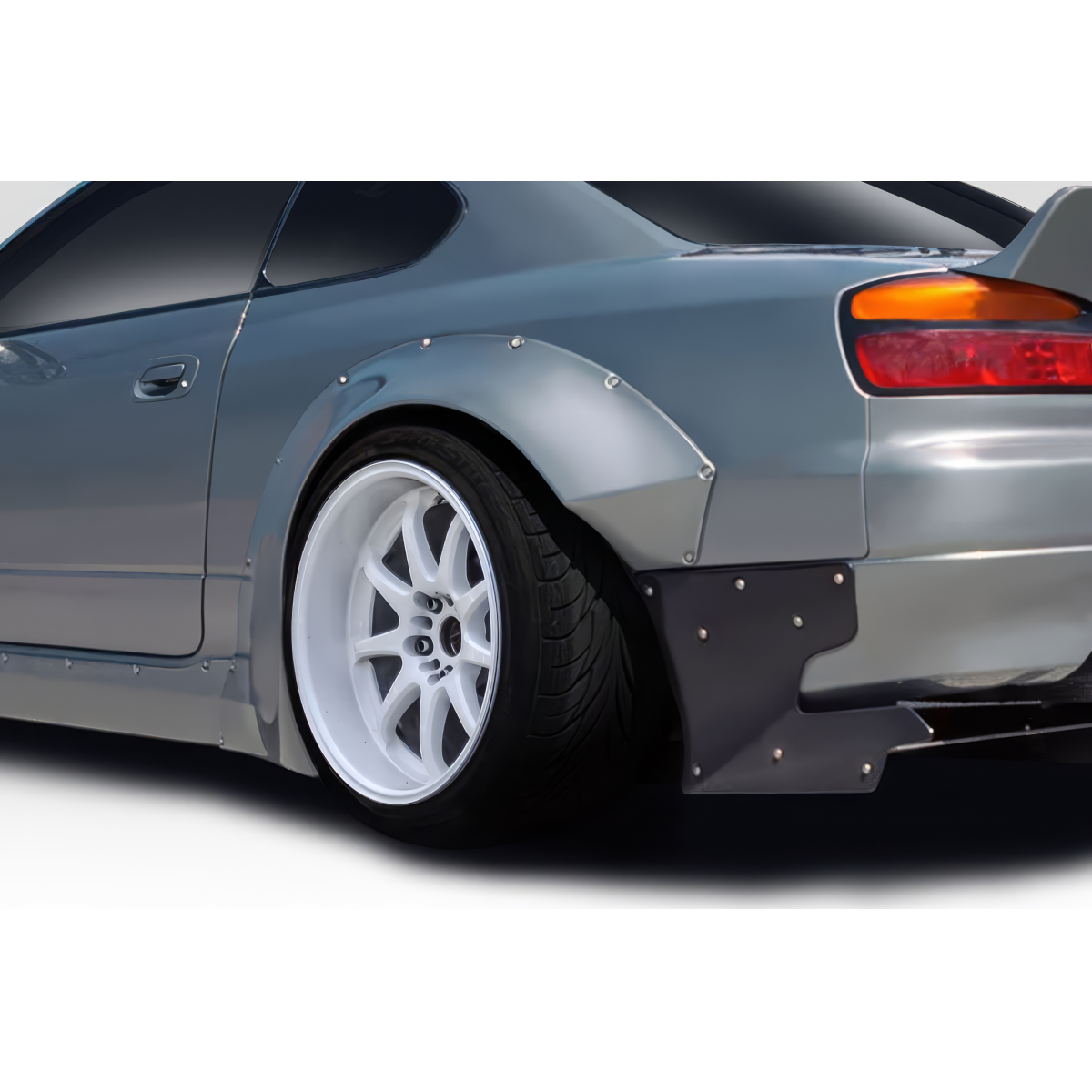 Modify your Nissan Silvia 1999 with our Exterior/Fenders - Angled view of rear fender flare highlights design