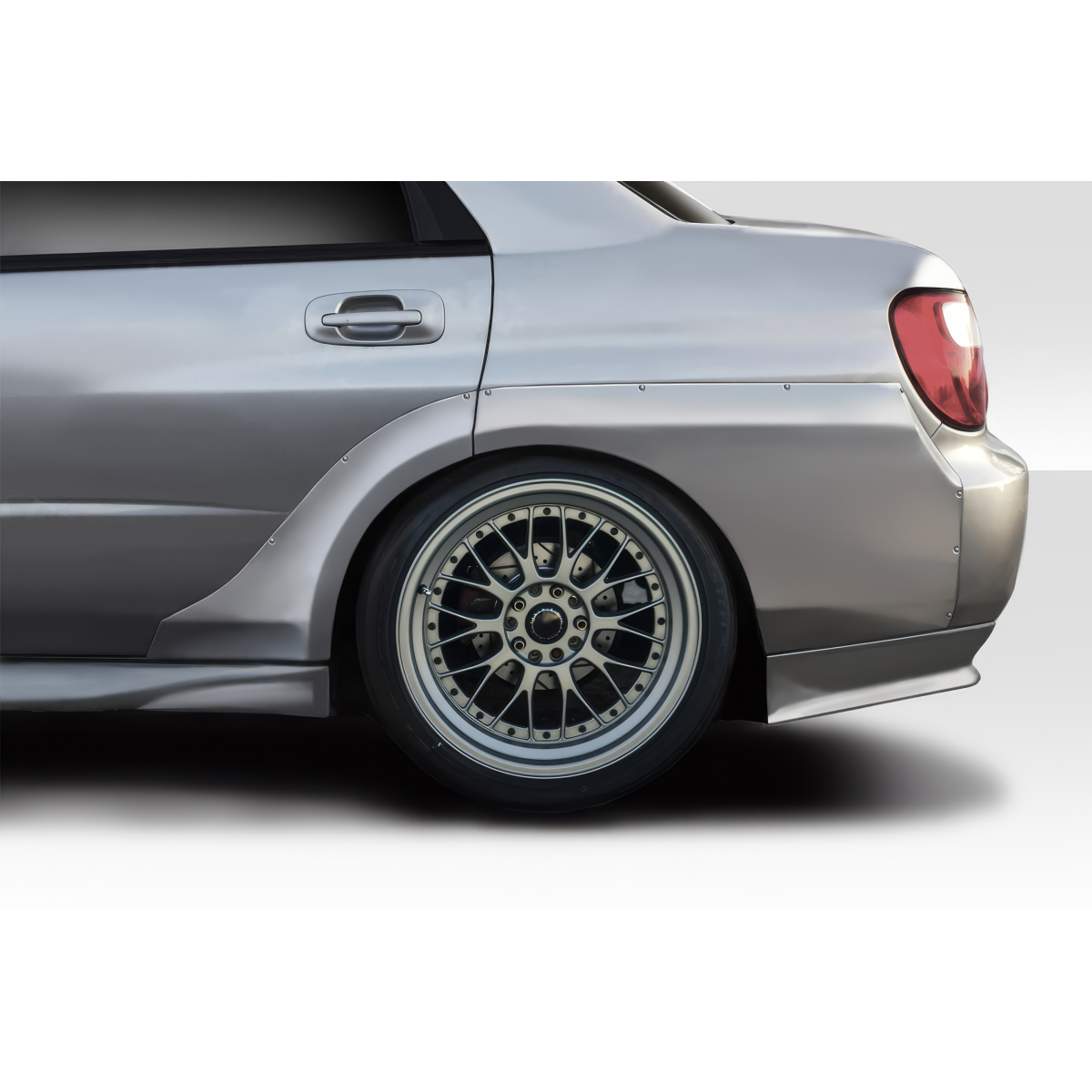 Modify your Subaru Impreza 2002 with our Exterior/Fenders - Side view of the car highlighting the fender